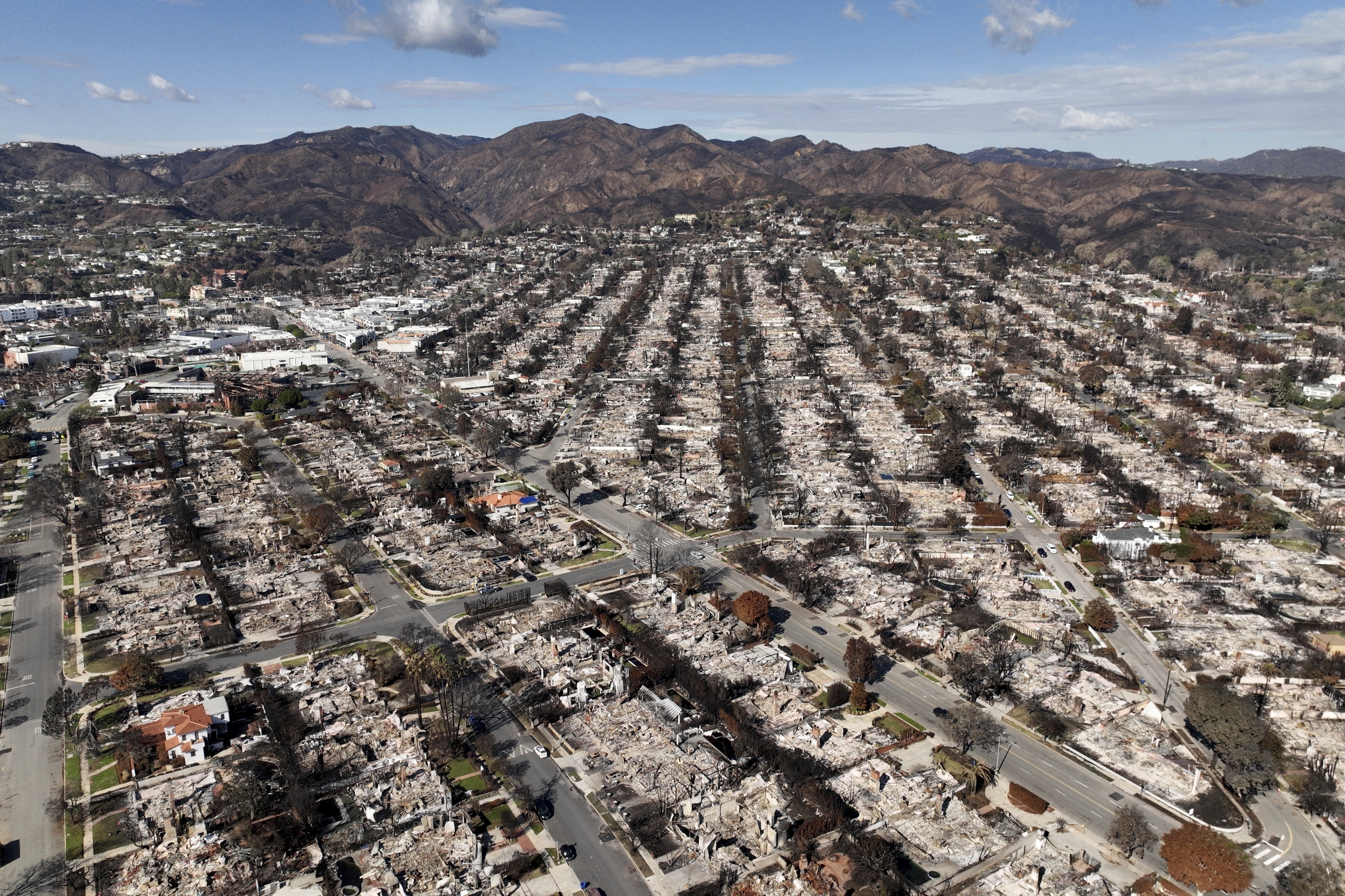 The devastation from the Palisades Fire is shown in an aerial view of Los Angeles, Jan. 27, 2025. California's plan to fix the insurance crisis had barely rolled out when the Los Angeles fires began. Can the market recover and stabilize?