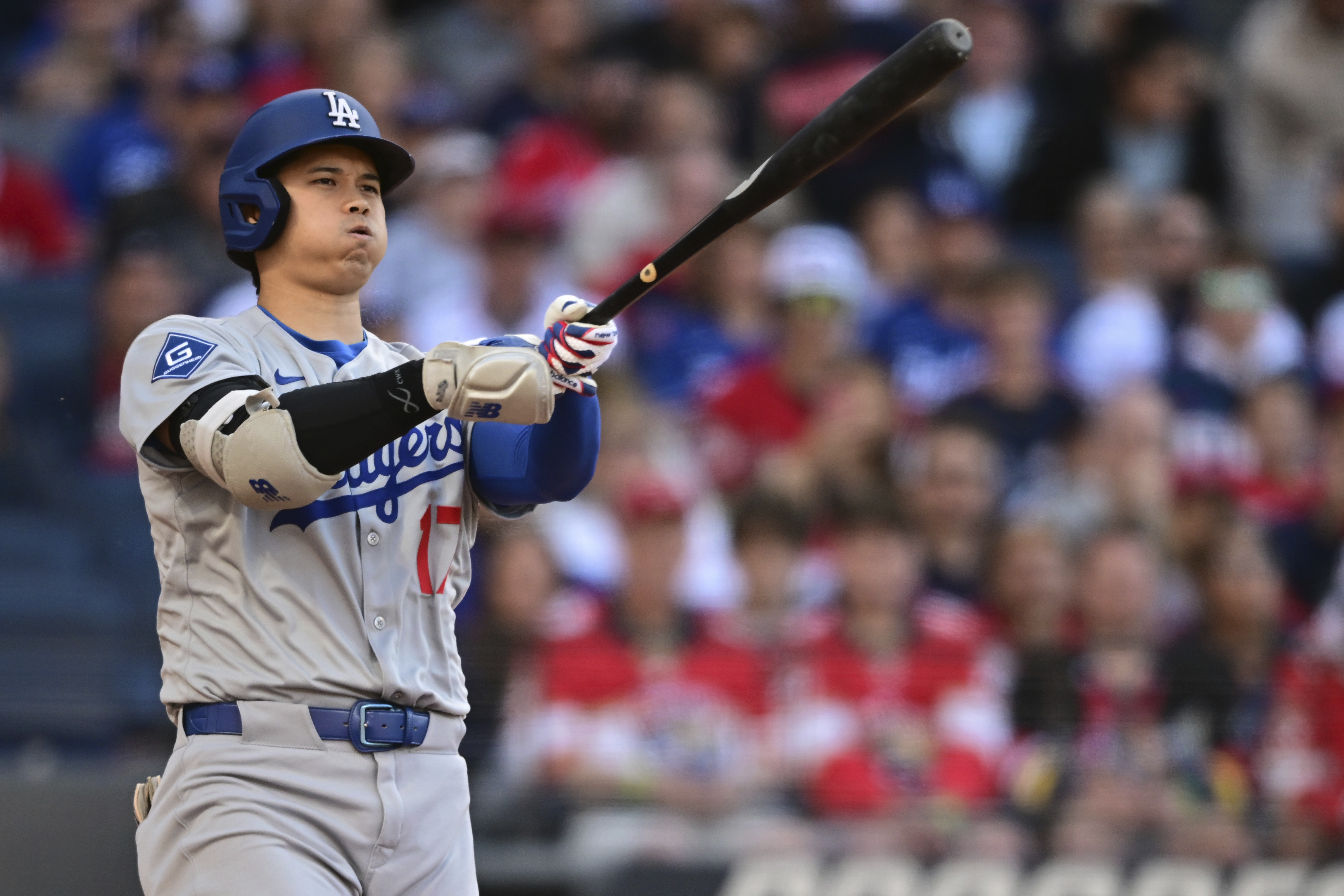 Los Angeles Dodgers' Shohei Ohtani reacts after swinging at a pitch during the second inning of a baseball game against the Cleveland Guardians, Monday, May 26, 2025, in Cleveland. 