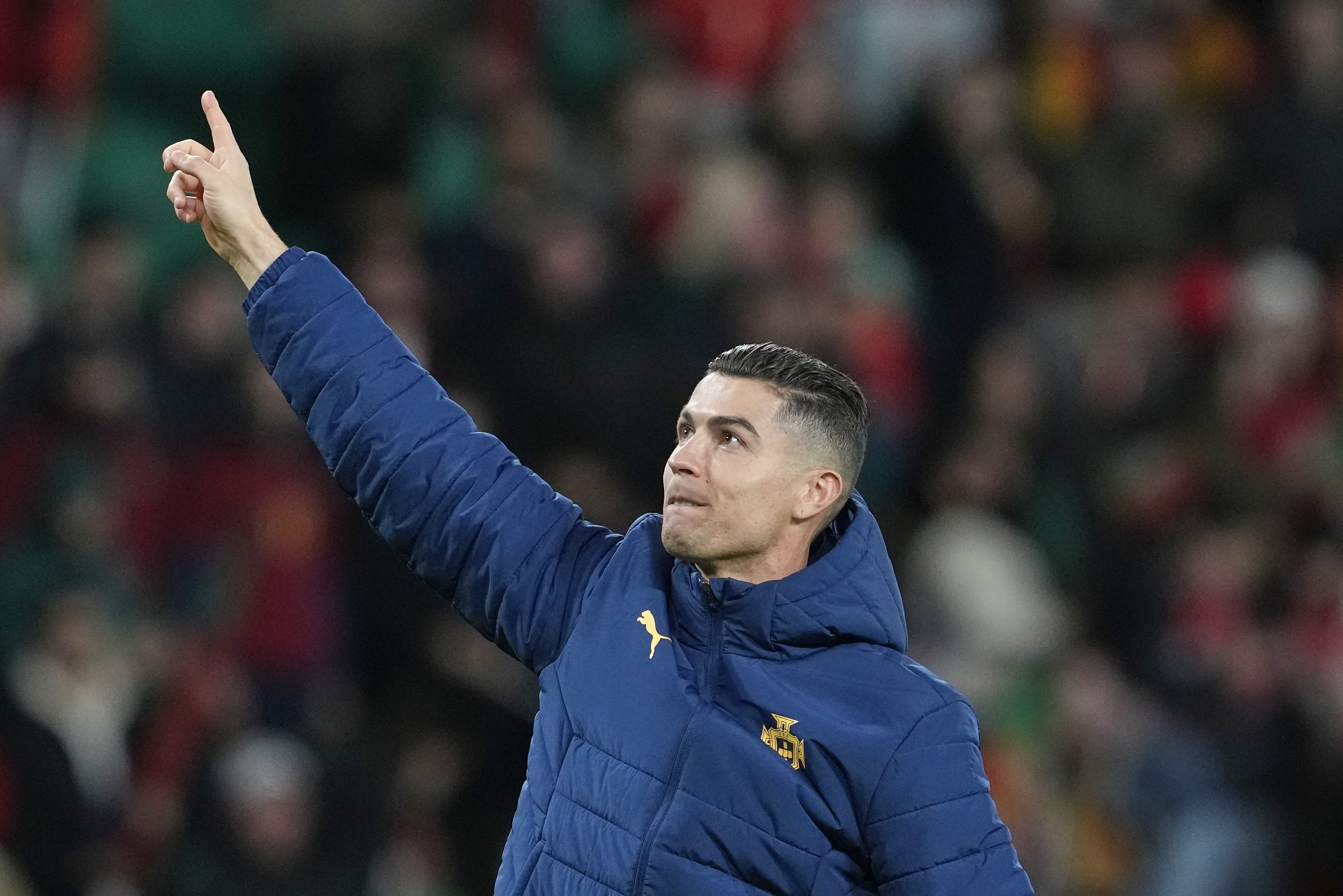 FILE - Portugal's Cristiano Ronaldo gestures to the crowd after winning the UEFA Nations League soccer match between Portugal and Denmark, at the Jose Alvalade Stadium in Lisbon, March 23, 2025. 