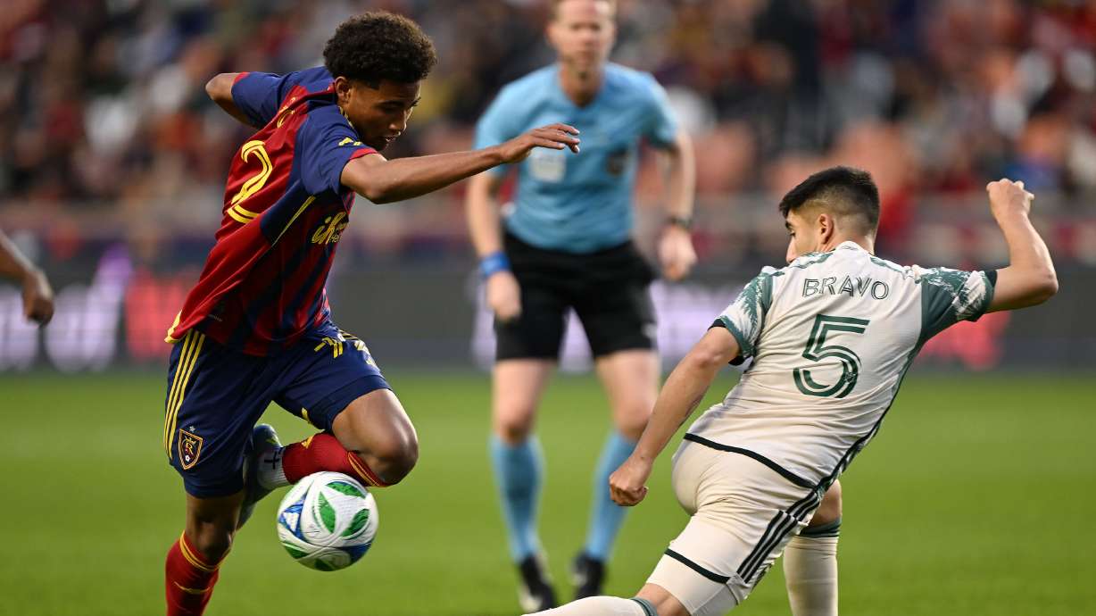 Real Salt Lake forward Zavier Gozo (72) gets around Portland Timbers defender Claudio Bravo (5) as they play at America First Field in Sandy on Wednesday, May 14, 2025.