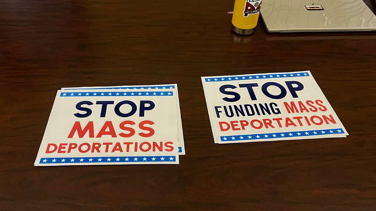 Results of a survey released on May 20 show that more Americans think immigrants here illegally face discrimination than any other group. The April 30 image shows signs at a Salt Lake City conference organized by immigrant advocates.