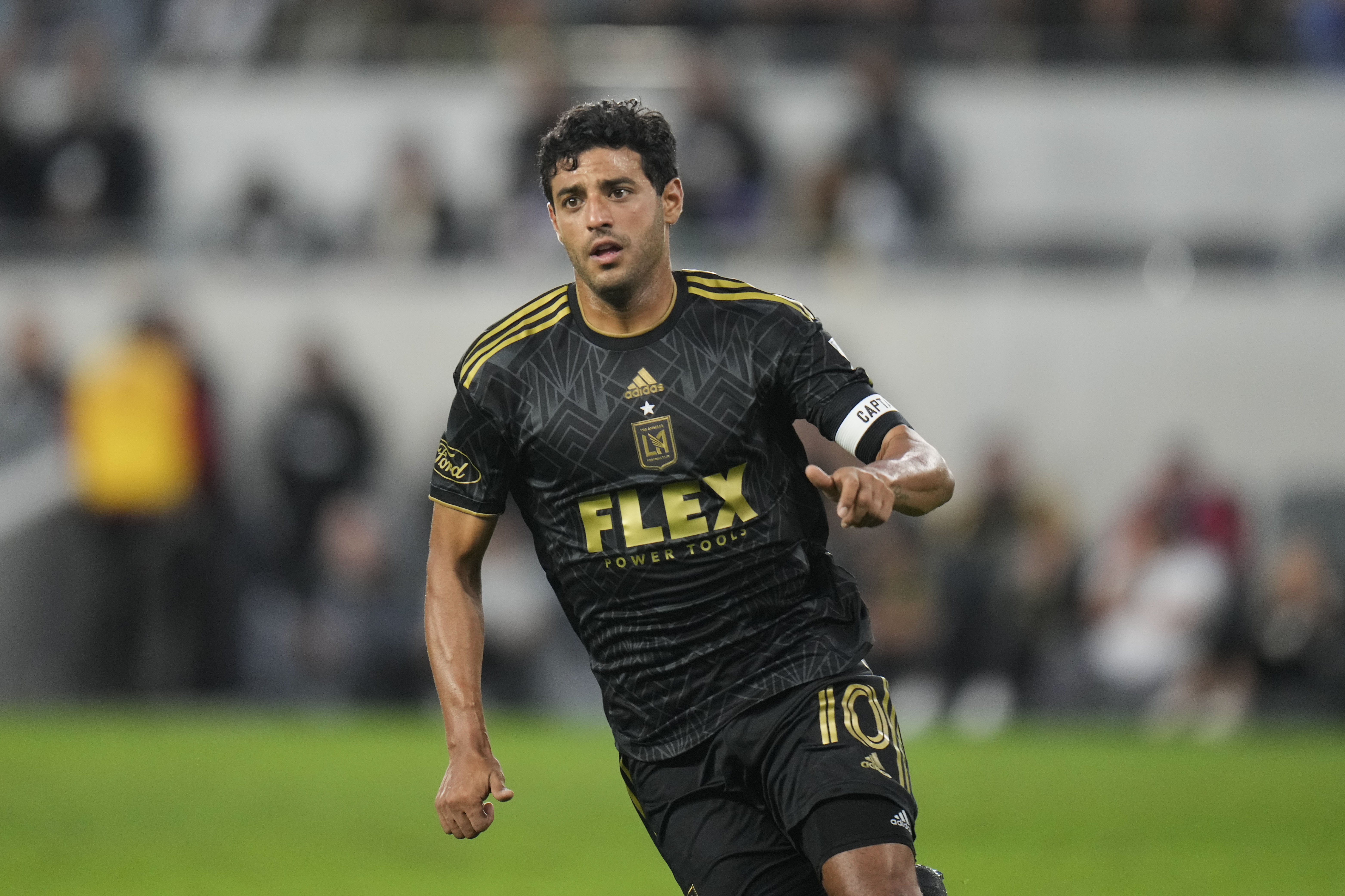 FILE - Los Angeles FC forward Carlos Vela chases the ball during the second half of an MLS soccer match against the Real Salt Lake on Oct. 1, 2023, in Los Angeles. 