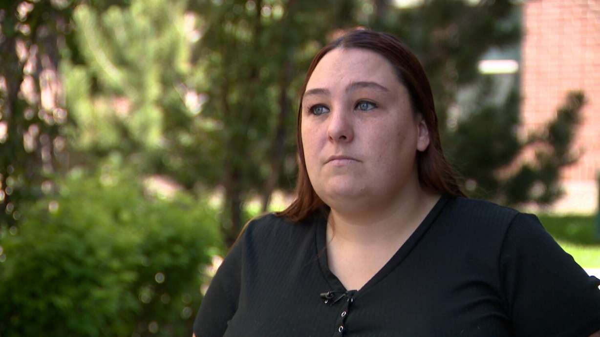 Kady Doyle speaks with KSL-TV outside her apartment in Midvale on Tuesday about stolen online benefits.