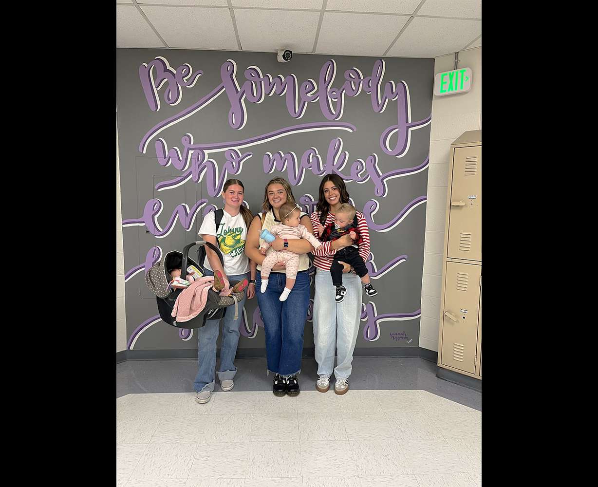 Tallee Carter, Libby Lindsay and Ava Morrell with the kids they brought for their senior prank in Blackfoot, Idaho.