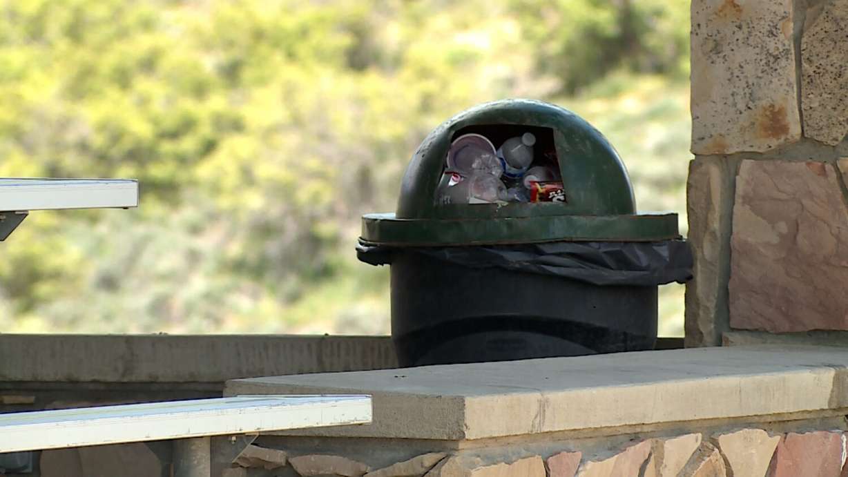 A full garbage bin is seen at Jordanelle State Park on Tuesday following the busy Memorial Day weekend.