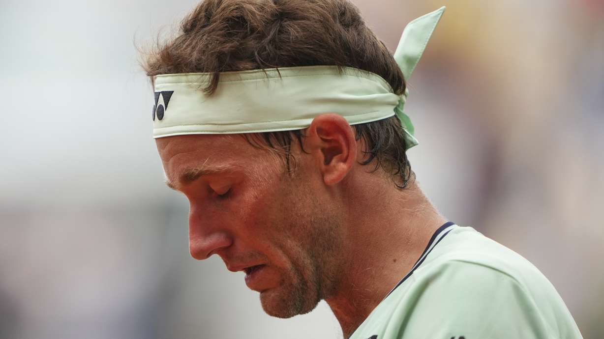 Norway's Casper Ruud looks down as he plays Portugal's Nuno Borges during their second round match of the French Tennis Open, at the Roland-Garros stadium, in Paris, Wednesday, May 28, 2025.