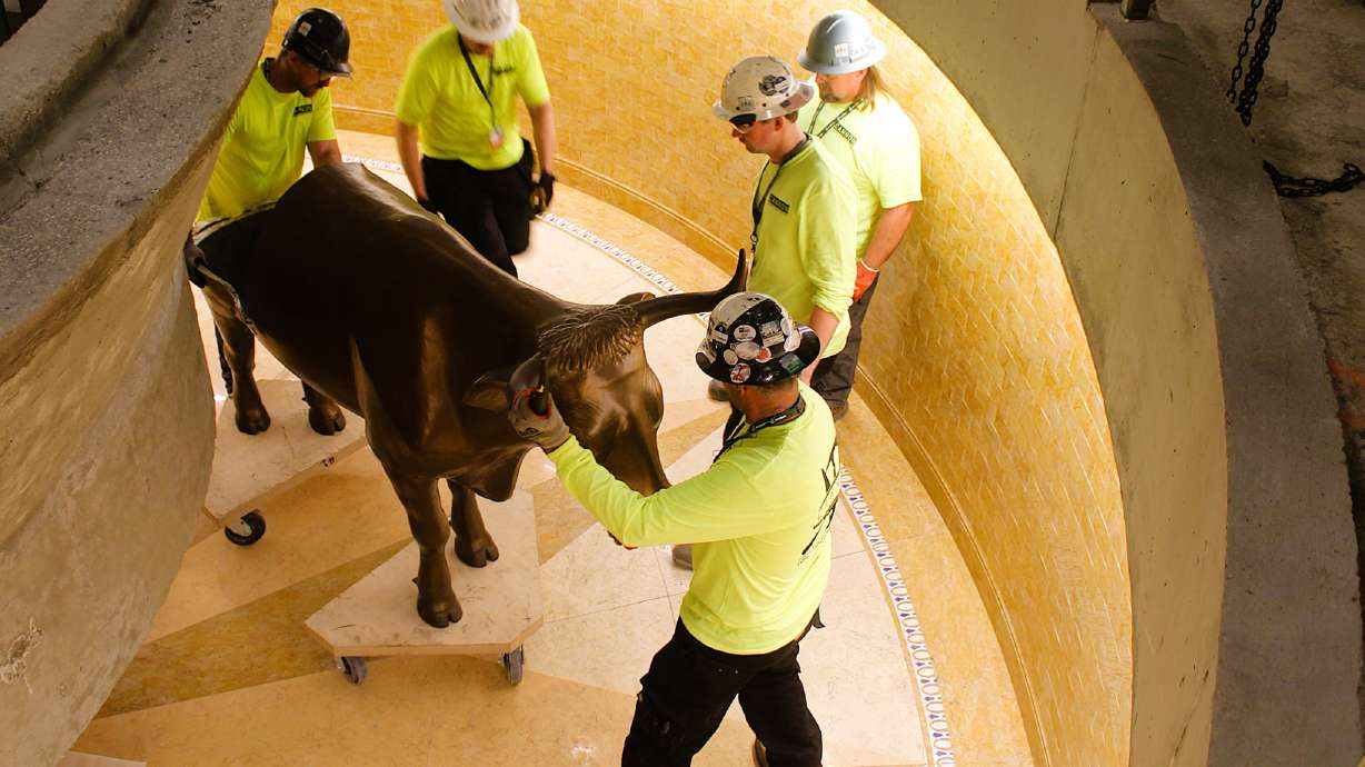 Original cast-iron oxen in the east baptismal font of the Salt Lake Temple are reinstalled on April 10, after undergoing restoration work. The Salt Lake Temple will feature a second baptismal font when it opens in 2027.