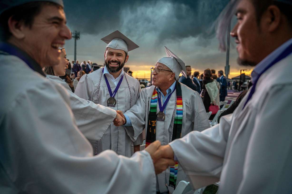Many of the Weber State students in line to secure entrepreneurship certificates in the Ogden school's new Building Puentes program took part in commencement exercises on April 25.