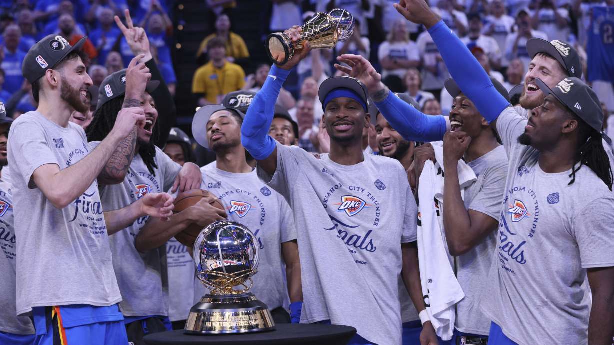 Oklahoma City Thunder guard Shai Gilgeous-Alexander (2), middle, celebrates with teammates after Game 5 of the Western Conference finals of the NBA basketball playoffs against the Minnesota Timberwolves, Wednesday, May 28, 2025, in Oklahoma City.