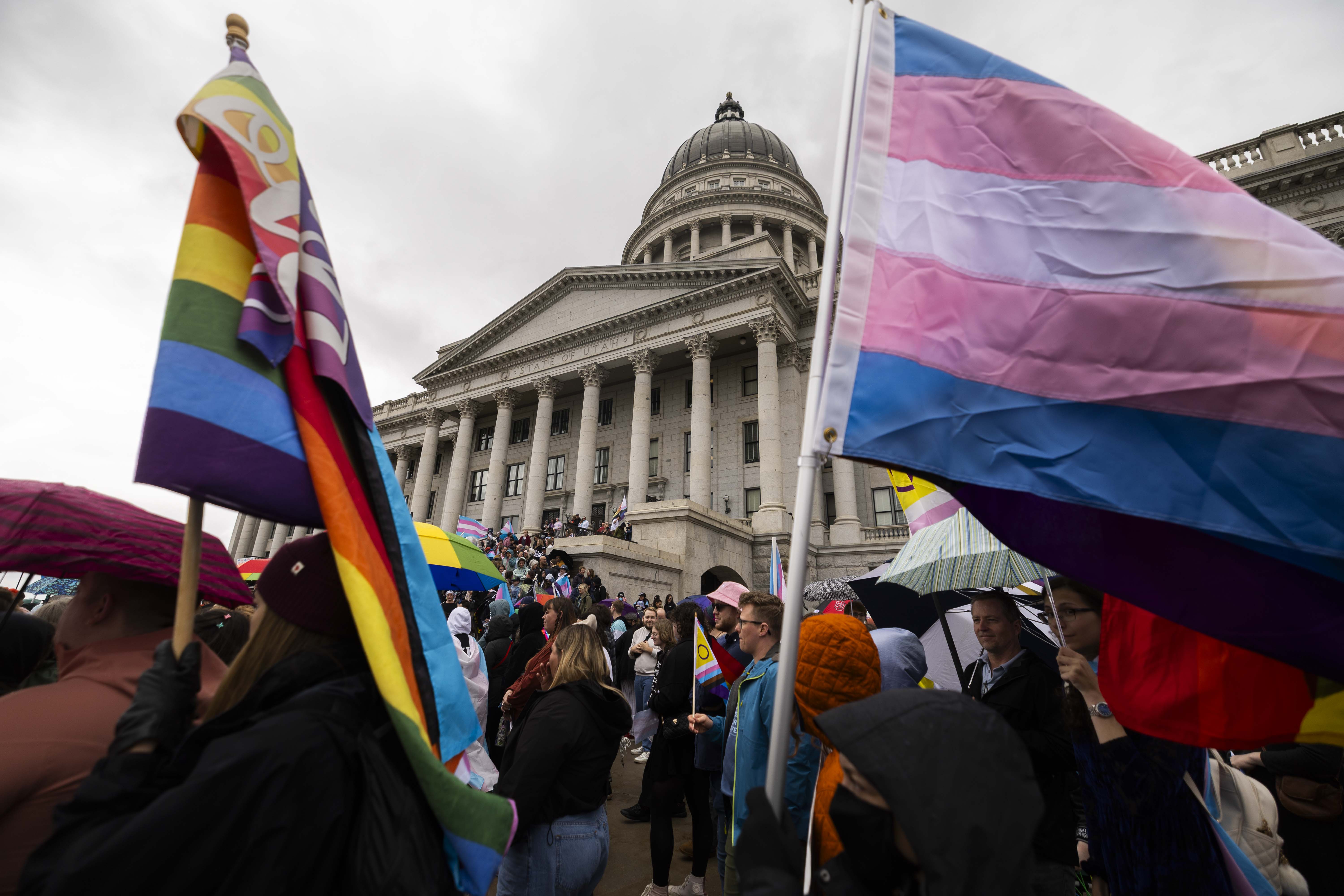 Protesters gather at a rally for Transgender Day of Visibility in Salt Lake City on March 29. A new report commissioned by the Utah Legislature found gender-related hormone therapies have "positive mental health" outcomes for children and teens.