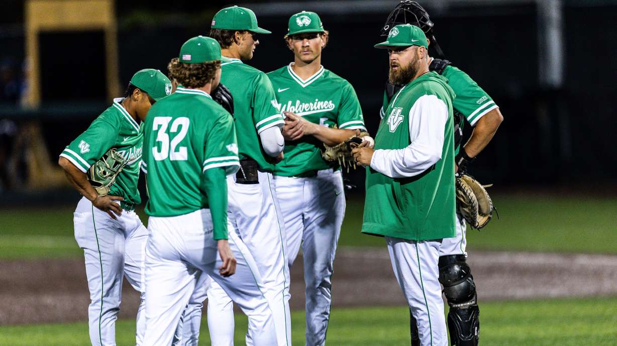 Utah Valley head coach Nate Rasmussen meets with his players on the mound during an NCAA baseball game at DoTerra Field at UCCU Ballpark in Orem, Utah, Monday, April 21, 2025.