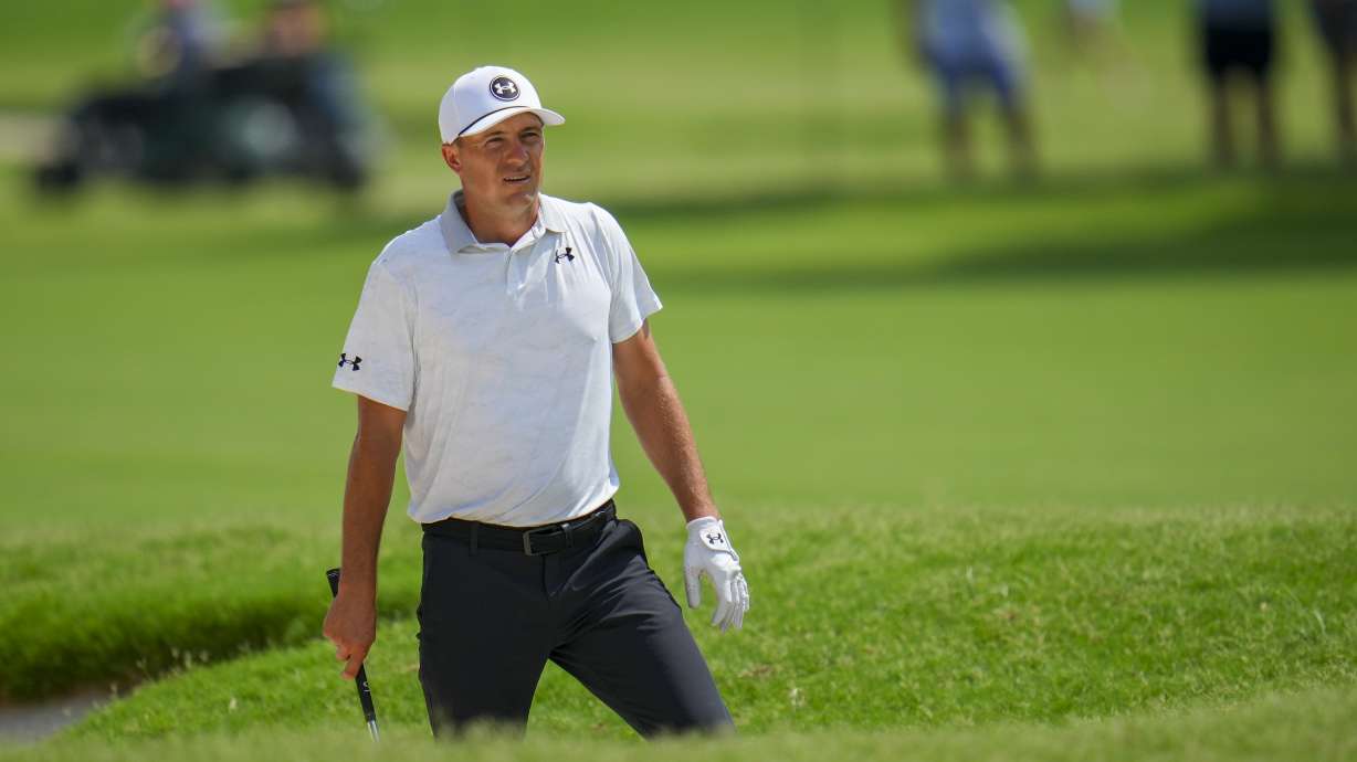 Jordan Spieth prepares to hit an approach shot on the sixth hole during the final round of the Charles Schwab Challenge golf tournament at Colonial Country Club in Fort Worth, Texas, Sunday, May 25, 2025.