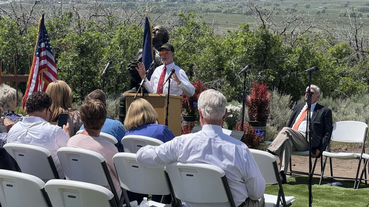 Dr. Steven Neal, a former surgeon and founder and president of Monument of the Americas, speaks at the groundbreaking for the sculpture gardens in Heber City on Thursday.