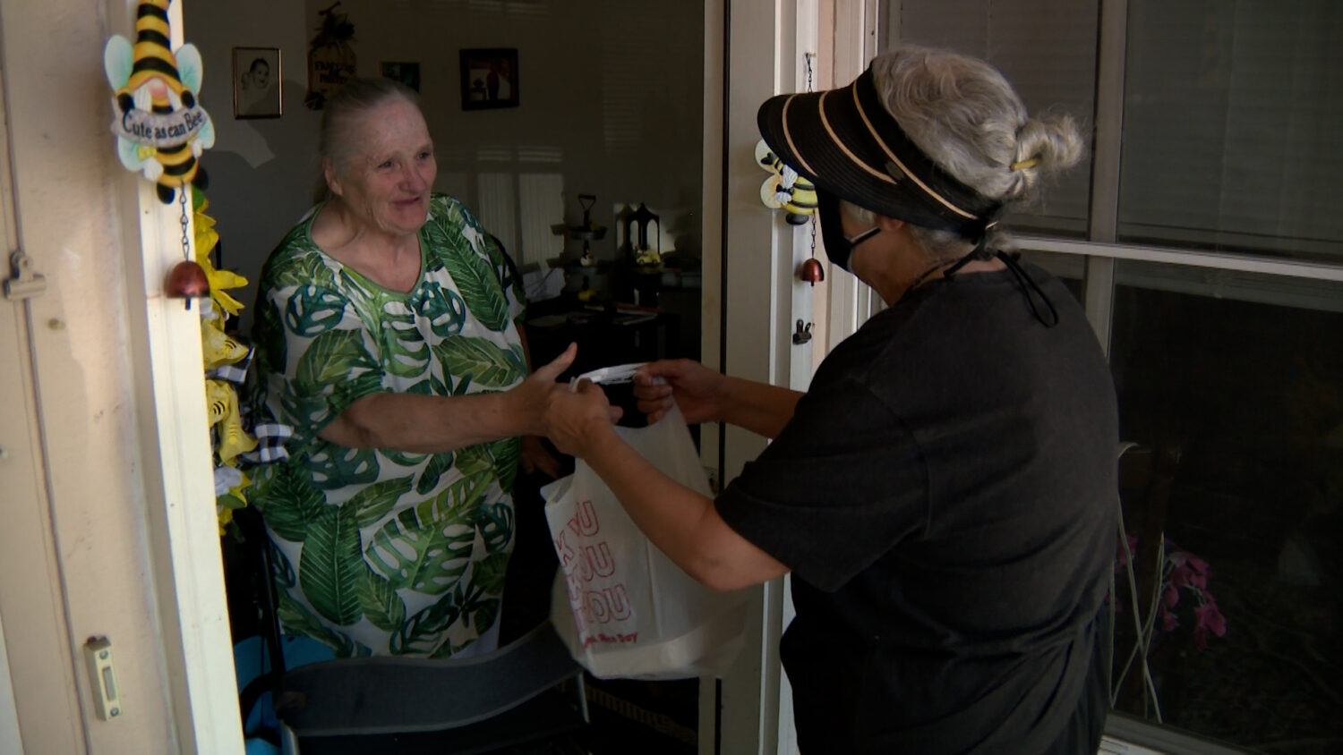 Bonnie Carter receives a meal from Meals on Wheels at her home in Clearfield on Thursday. The agency faces a shortage of good volunteers as the need increases.