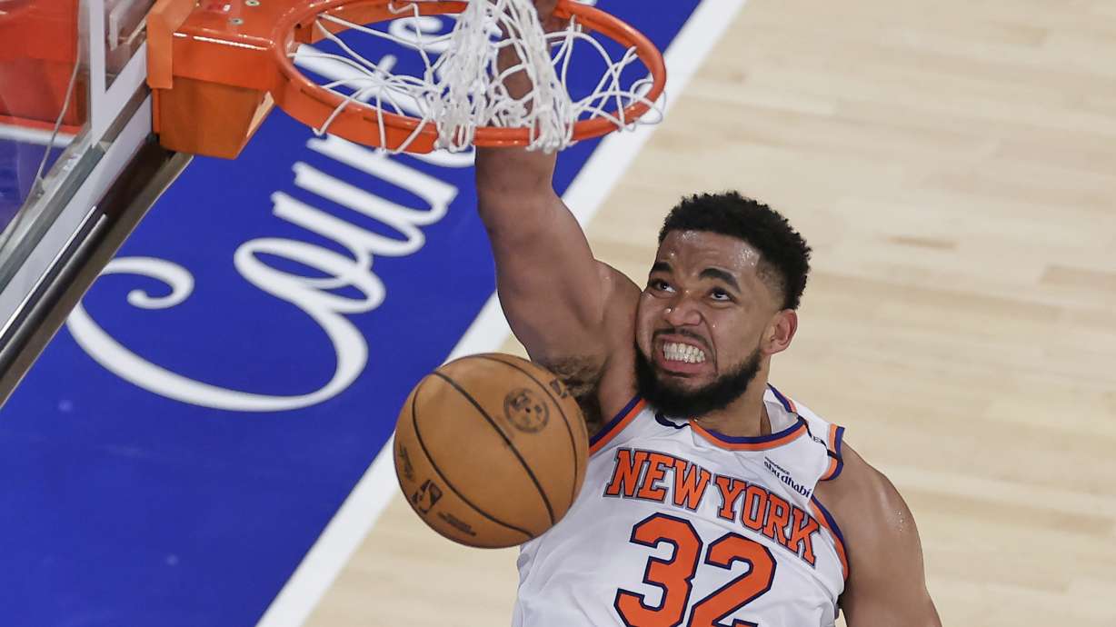 New York Knicks center Karl-Anthony Towns (32) scores against the Indiana Pacers during the fourth quarter of Game 5 of the NBA basketball Eastern Conference final, Thursday, May 29, 2025, in New York.