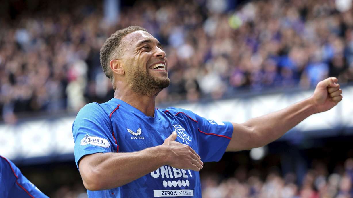 Rangers' Cyriel Dessers celebrates scoring their side's first goal of the game during the Scottish Premiership soccer match between Rangers and Celtic at Ibrox Stadium, Glasgow, Scotland, Sunday, May 4, 2025.