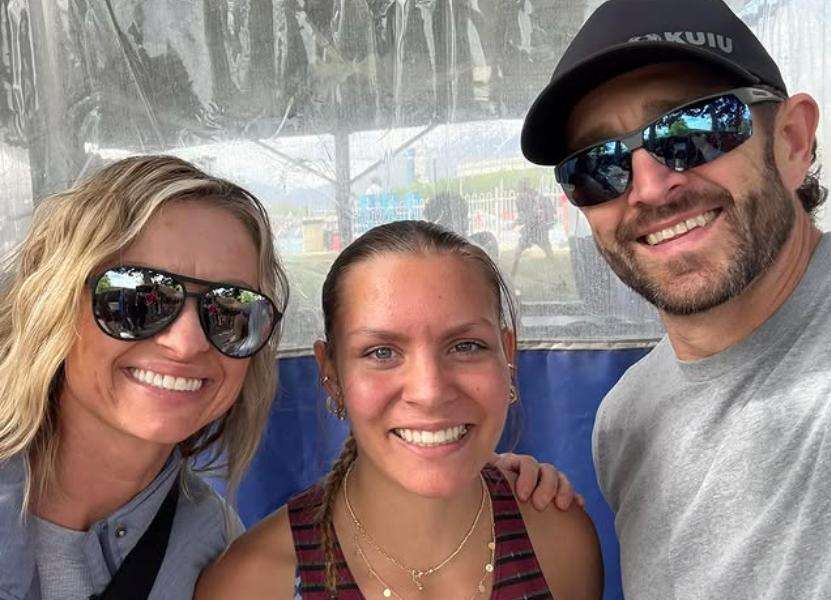 Tasha and Nick Weiers pose with their daughter Lina, 17, a track star at Morgan High School. Lina was hit by a car on May 25 and may never walk again.