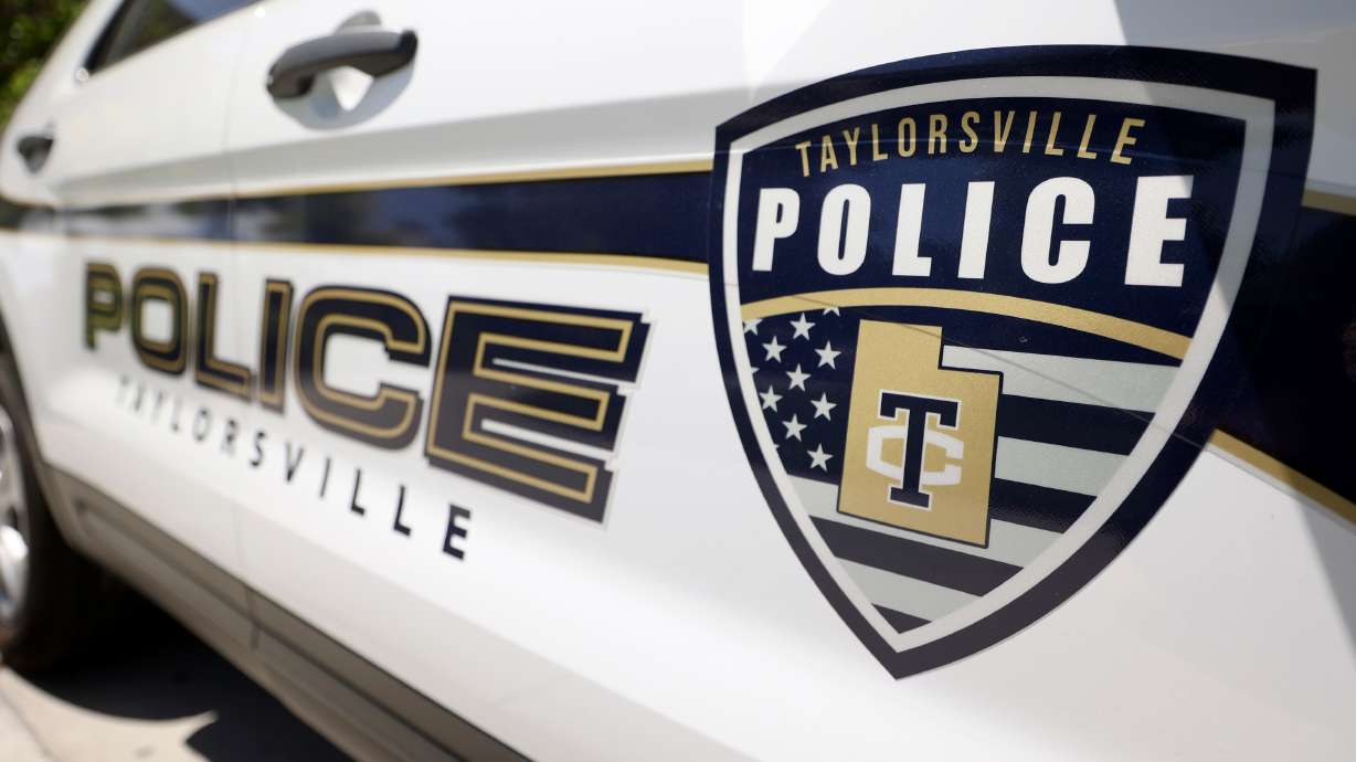A woman died after Taylorsville police say she fled from a traffic stop in a stolen vehicle and crashed.