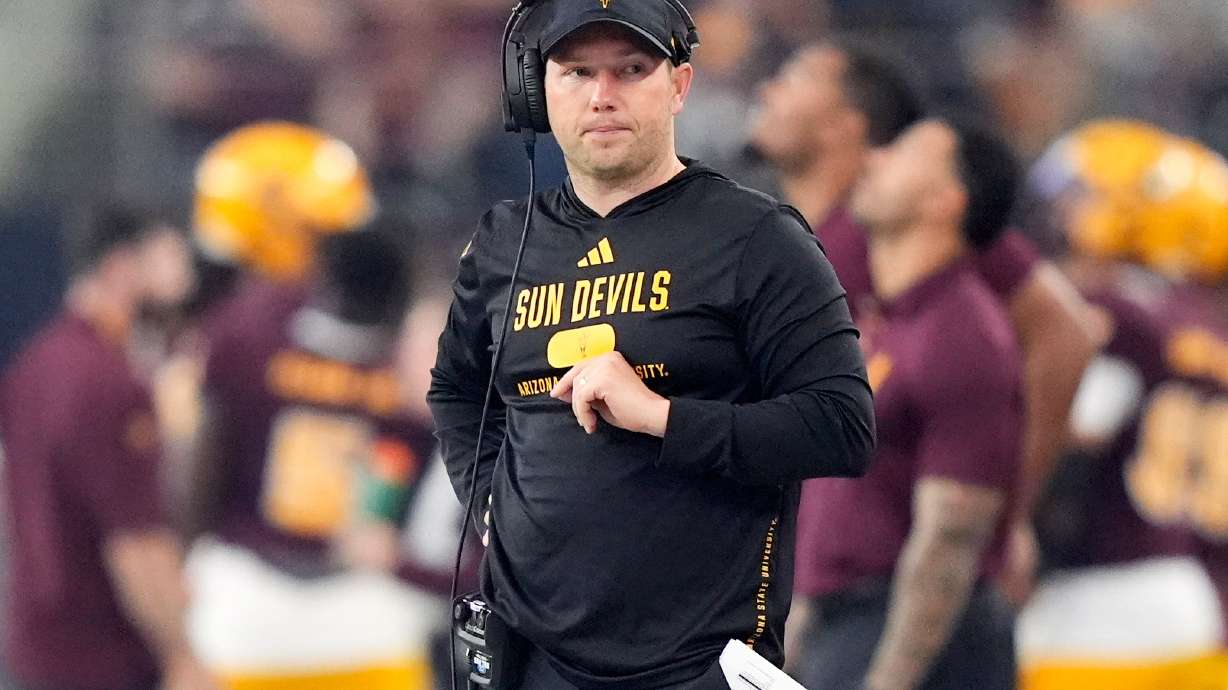 FILE - Ariona State head coach Kenny Dillingham stands on the sideline during the first half of the Big 12 Conference championship NCAA college football game against Iowa State in Arlington, Texas, Saturday, Dec. 7, 2024.