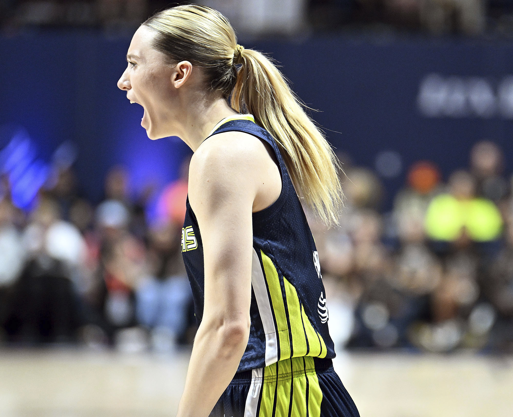 Dallas Wing's Paige Bueckers reacts to a foul during a WNBA basketball game against the Connecticut Sun, Tuesday, May 27, 2025, in Uncasville, Conn.