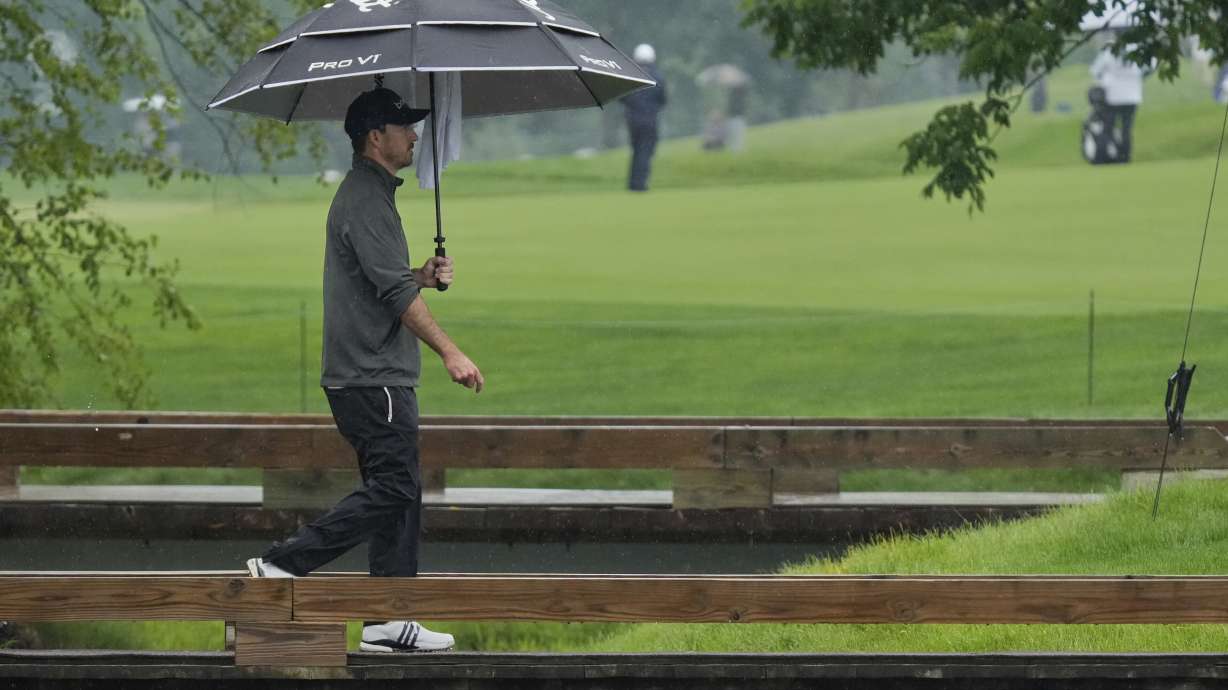 Nick Taylor walks across a bridge on the ninth hole during the second round of the Memorial golf tournament, Friday, May 30, 2025, in Dublin, Ohio.