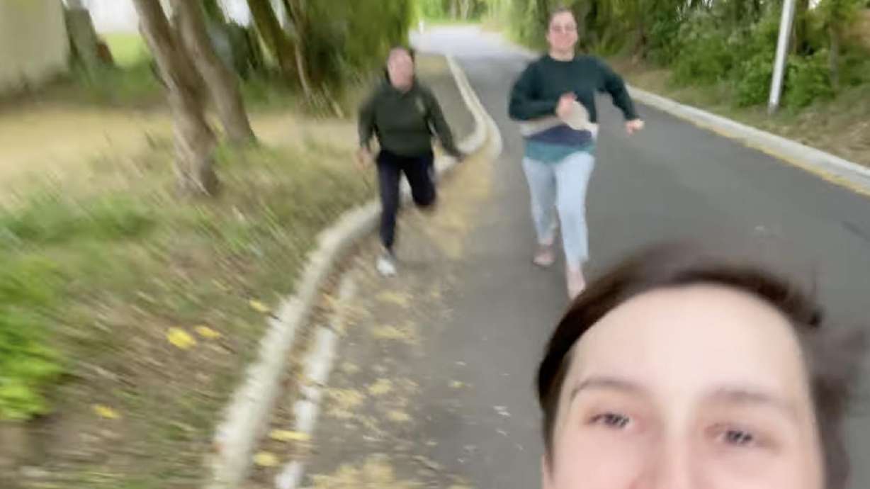 A trio of friends takes off in a footrace on April 18, in Sainte-Soulle, France.