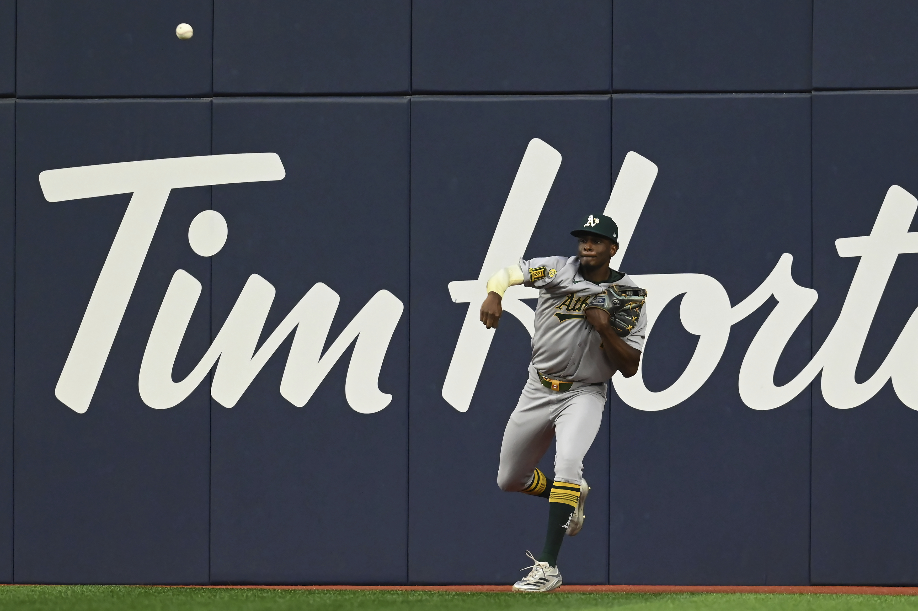Athletics center fielder Denzel Clarke (1) fields a ball off the bat of Toronto Blue Jays' Ernie Clement in second inning MLB baseball action in Toronto on Friday, May 30, 2025. 