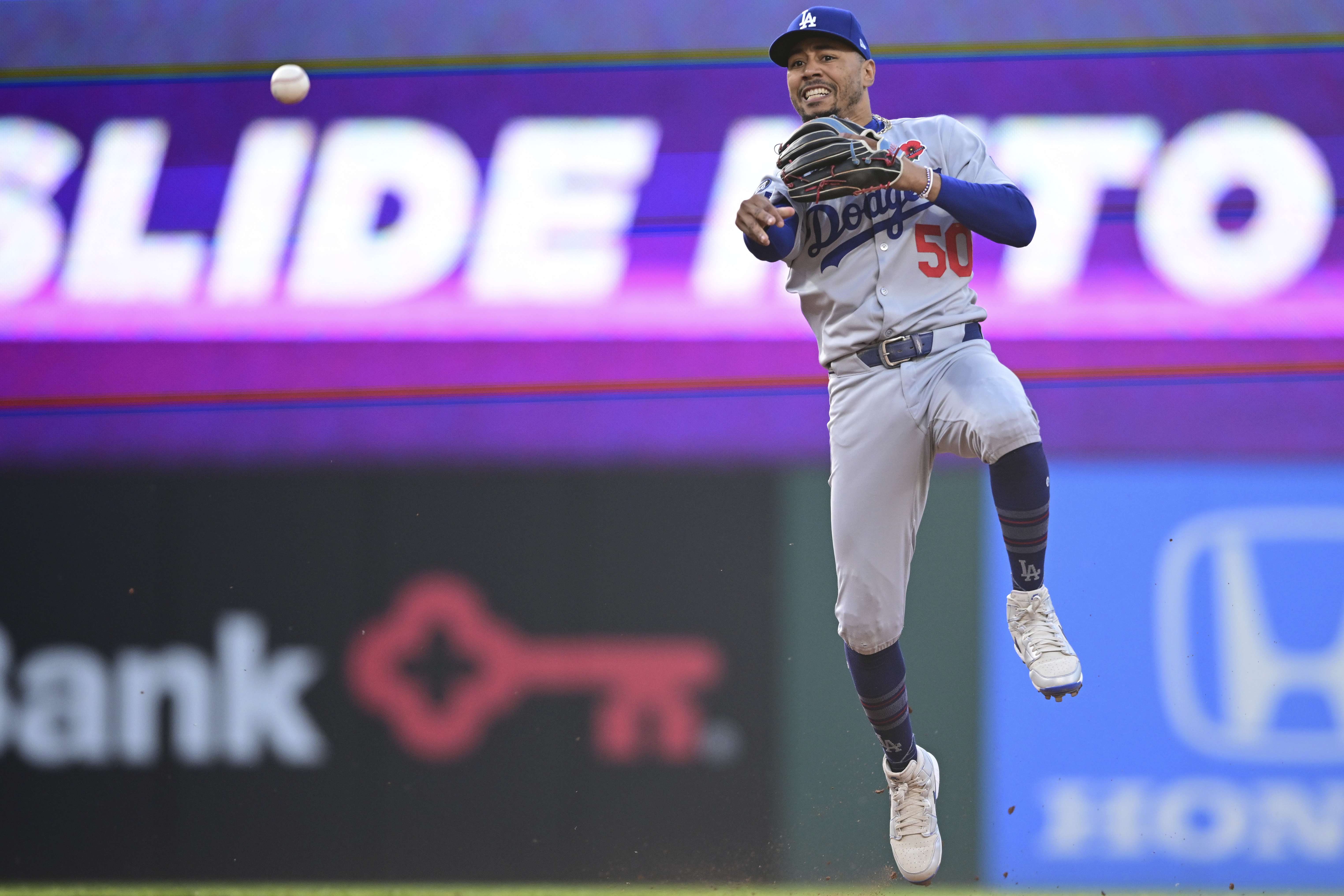 Los Angeles Dodgers shortstop Mookie Betts throws to first base to put out Cleveland Guardians' Gabriel Arias during the fifth inning of a baseball game, Monday, May 26, 2025, in Cleveland. 