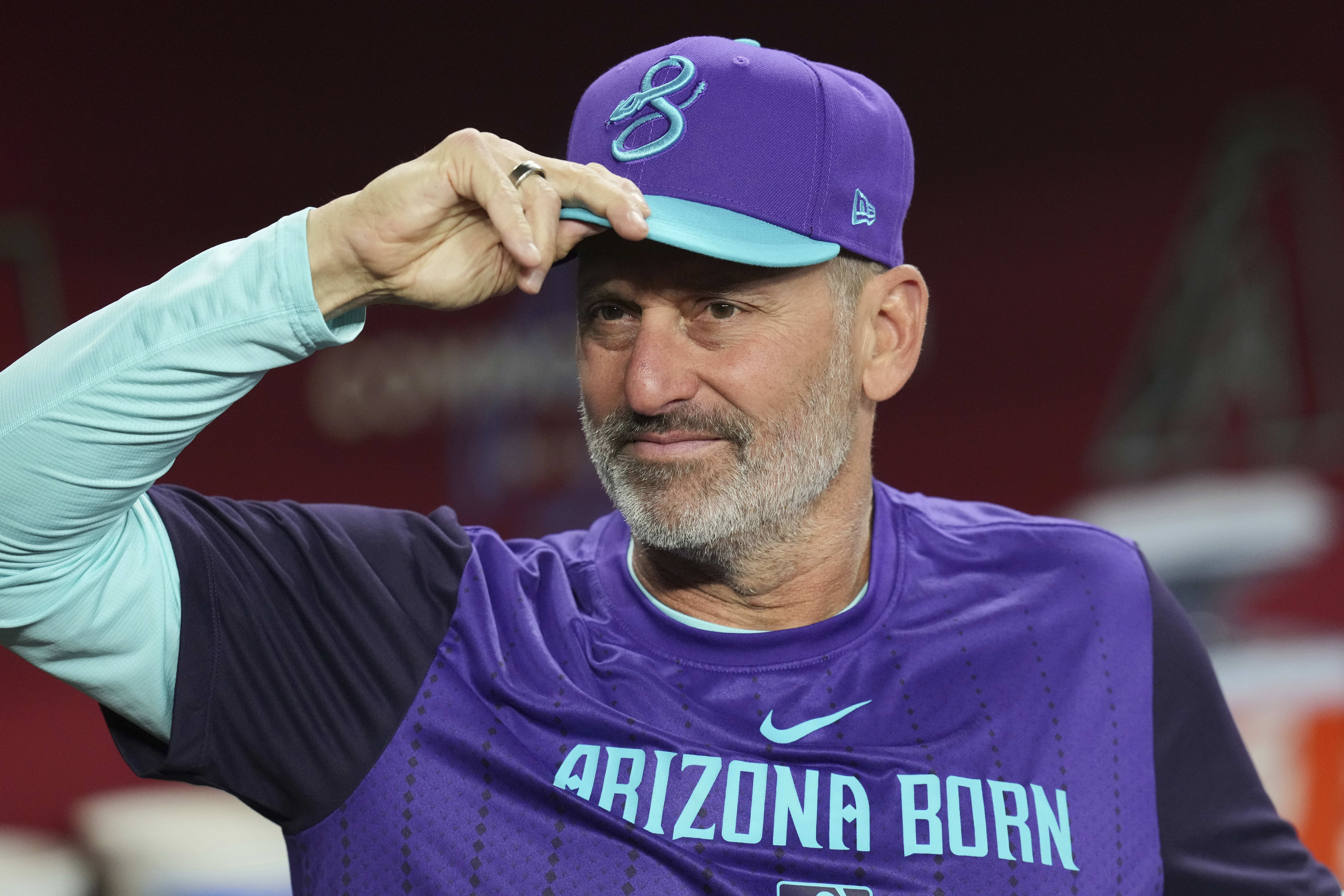 Arizona Diamondbacks manager Torey Lovullo pauses in the dugout prior to a baseball game against the Washington Nationals Friday, May 30, 2025, in Phoenix. 