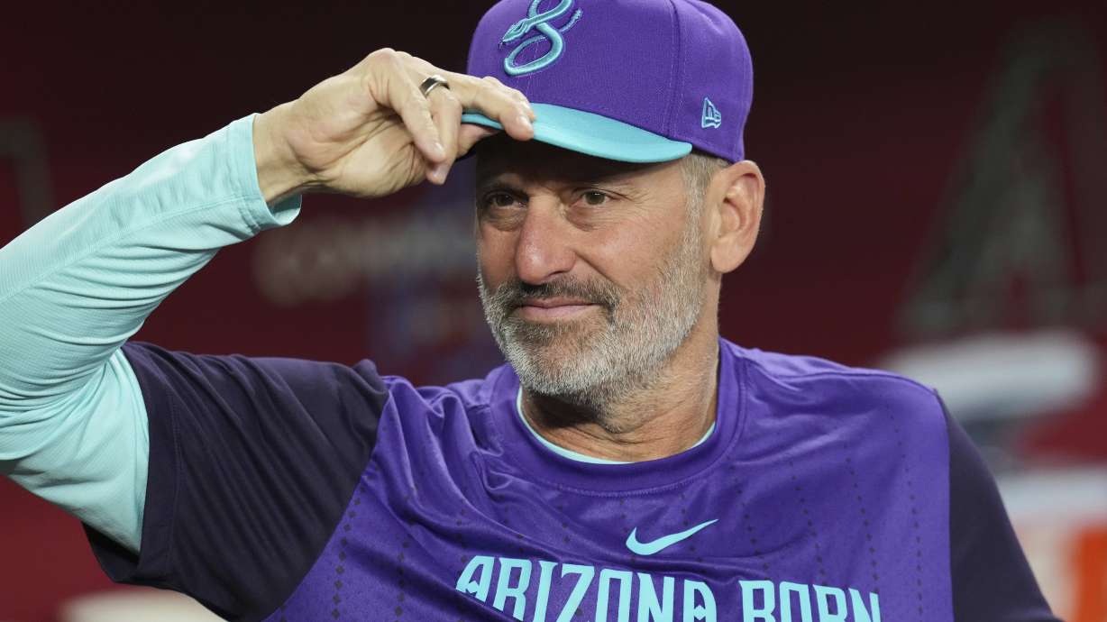 Arizona Diamondbacks manager Torey Lovullo pauses in the dugout prior to a baseball game against the Washington Nationals Friday, May 30, 2025, in Phoenix.