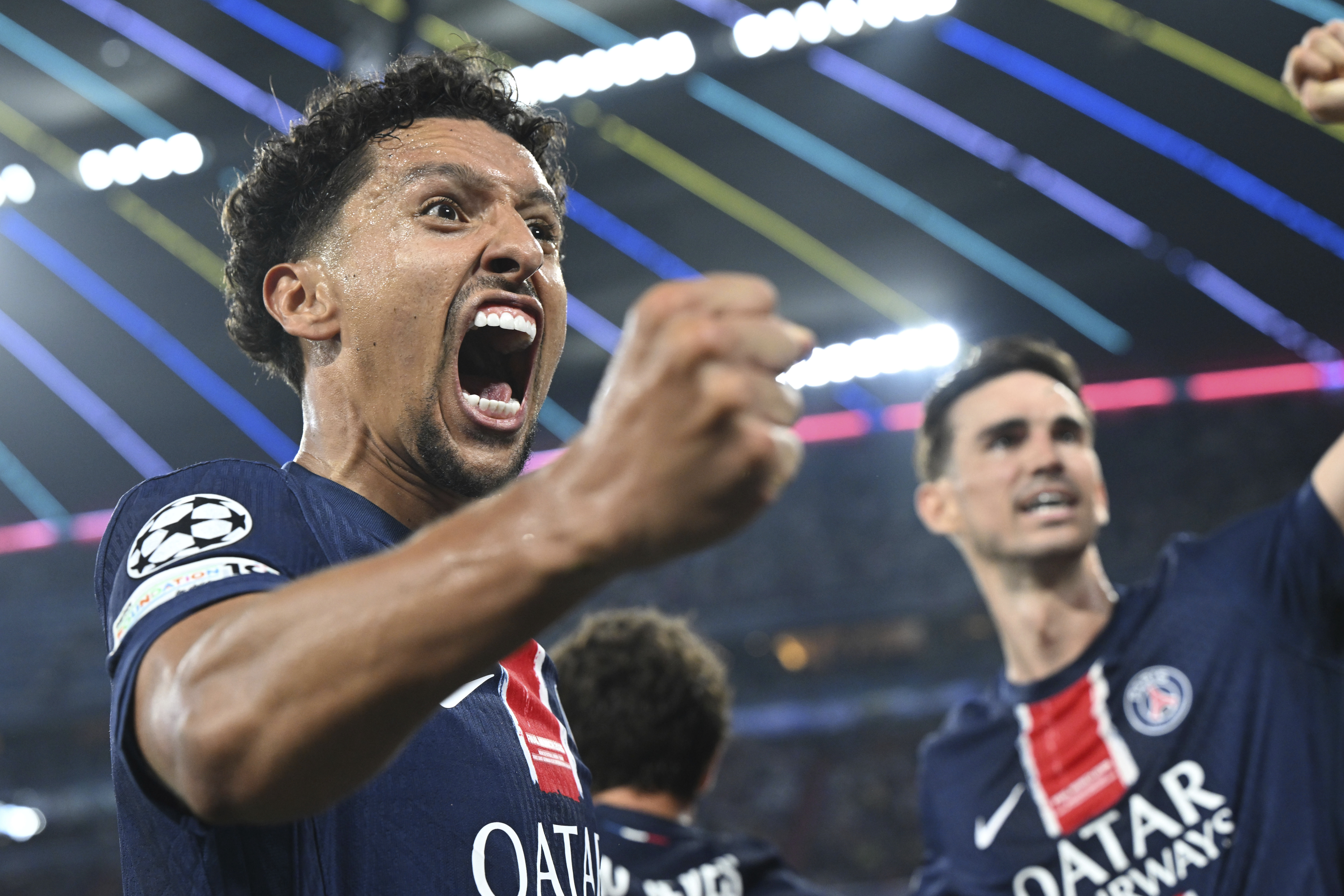 PSG's Marquinhos celebrates during the Champions League final soccer match between Paris Saint Germain and Inter Milan, at the Allianz Arena in Munich, Germany, Saturday, May 31, 2025.