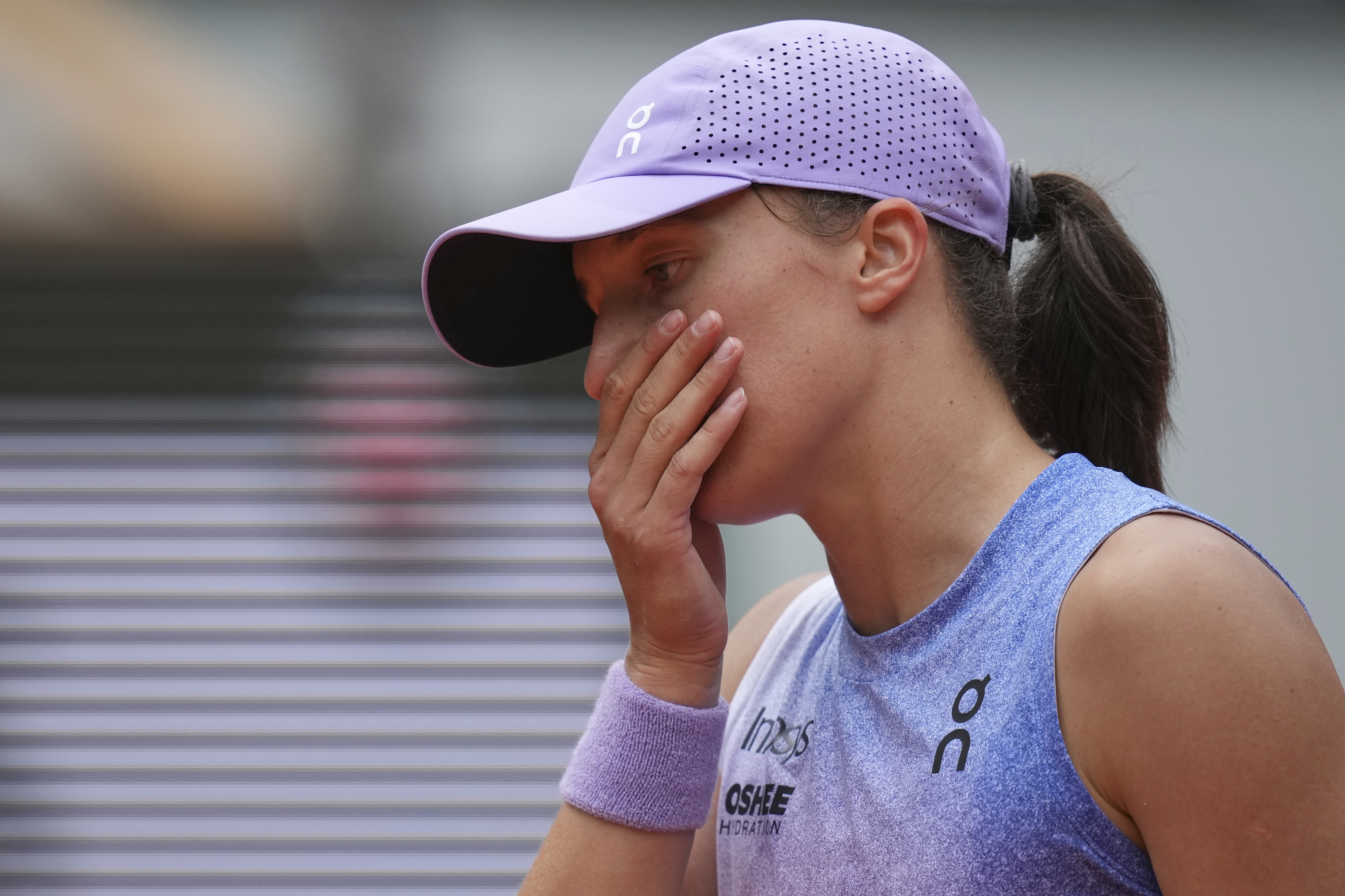 Poland's Iga Swiatek reacts as she plays Kazakhstan's Elena Rybakina during their fourth round match of the French Tennis Open, at the Roland-Garros stadium, in Paris, Sunday, June 1 2025. 