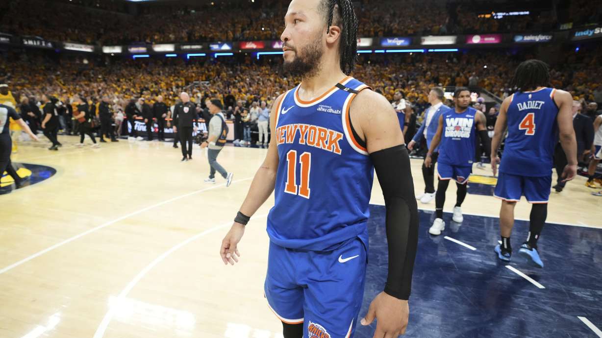 New York Knicks guard Jalen Brunson (11) reacts after losing to the Indiana Pacers in Game 6 of the Eastern Conference finals of the NBA basketball playoffs in Indianapolis, Saturday, May 31, 2025.