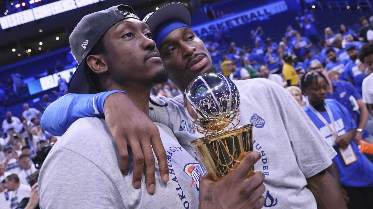 Oklahoma City Thunder forward Jalen Williams (8), left, and Oklahoma City Thunder guard Shai Gilgeous-Alexander (2) pose for a photo after Game 5 of the Western Conference finals of the NBA basketball playoffs against the Minnesota Timberwolves, Wednesday, May 28, 2025, in Oklahoma City.