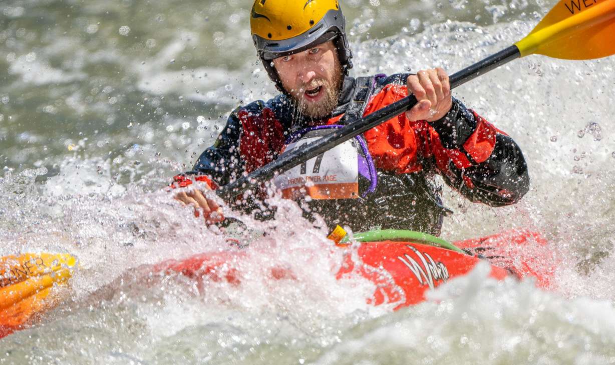 Erick Jones looks downriver as he and other competitors compete in the Provo River Race, a whitewater kayak competition in Provo Canyon on Saturday.