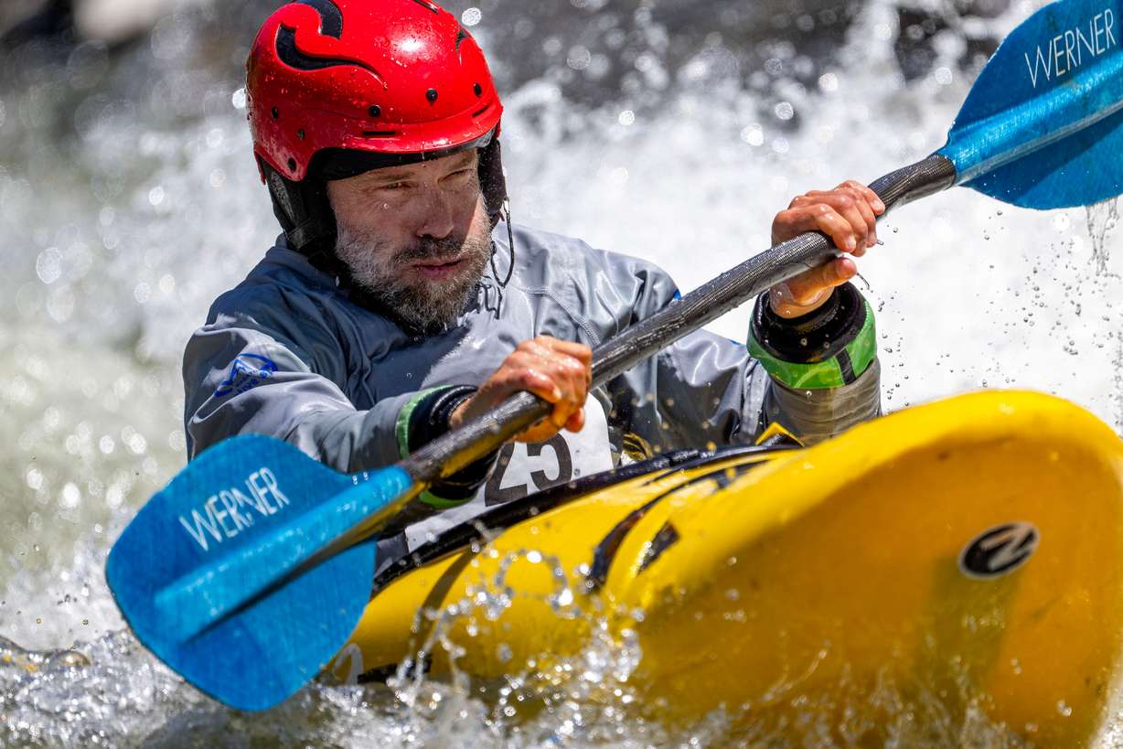 Jason Malczyk paddles hard as he and other competitors compete in the Provo River Race, a whitewater kayak competition in Provo Canyon on Saturday.