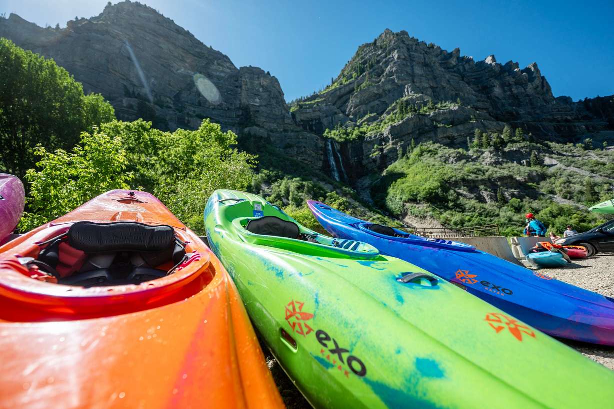 Kayaks wait to go into the water as competitors prepare to compete in the Provo River Race, a whitewater kayak competition in Provo Canyon on Saturday.