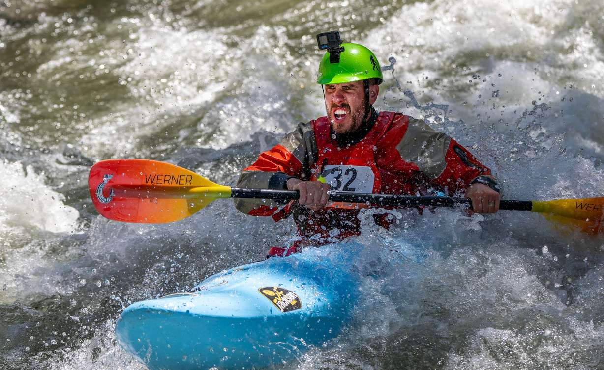 Marc Nelson and other competitors compete in the Provo River Race, a whitewater kayak competition in Provo Canyon on Saturday.