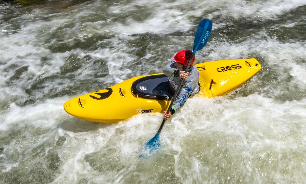 Jason Malczyk steers his kayak as he and other competitors compete in the Provo River Race, a whitewater kayak competition in Provo Canyon on Saturday.