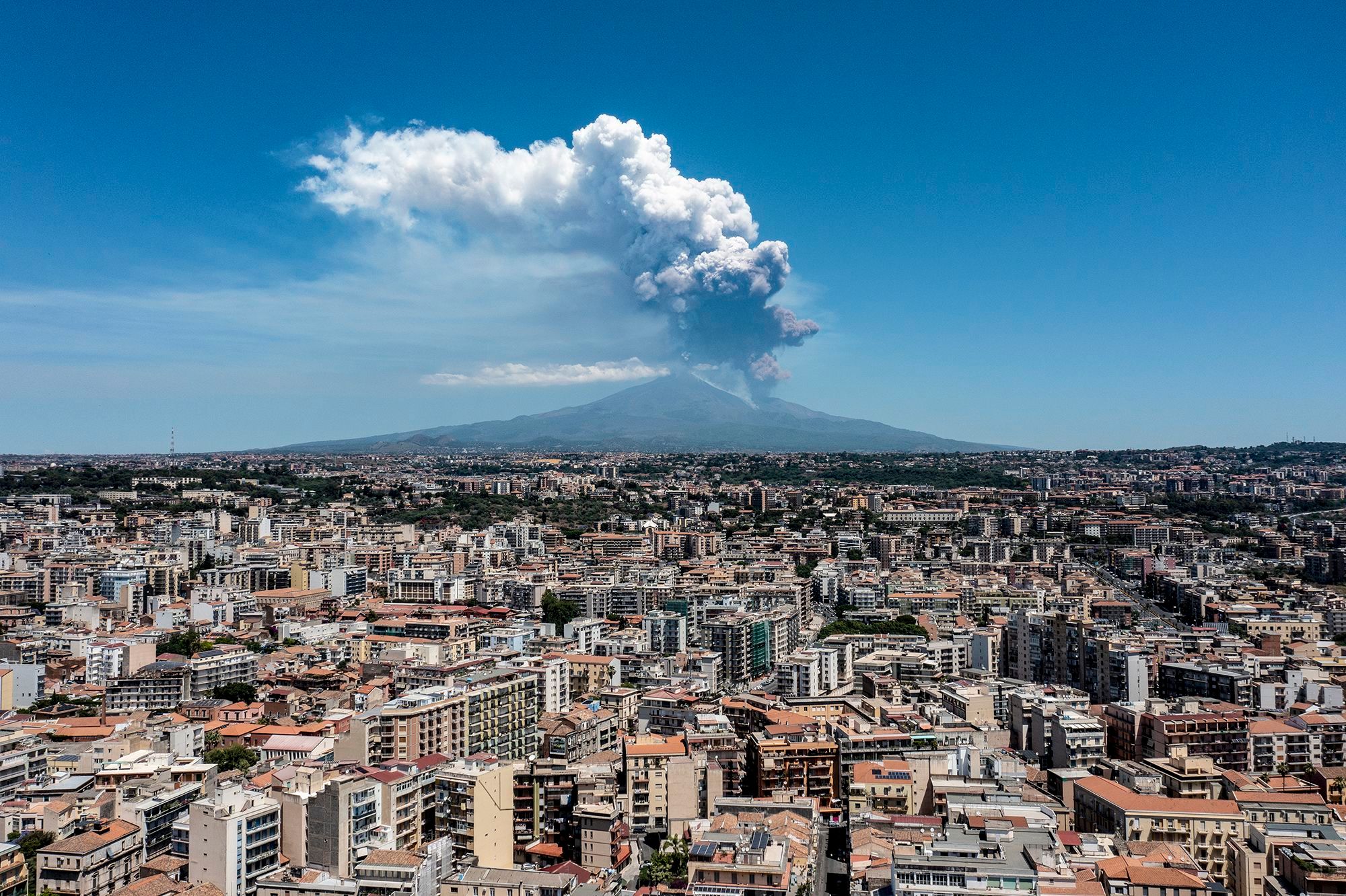 Huge eruption on Italy's Mount Etna leaves tourists fleeing volcano