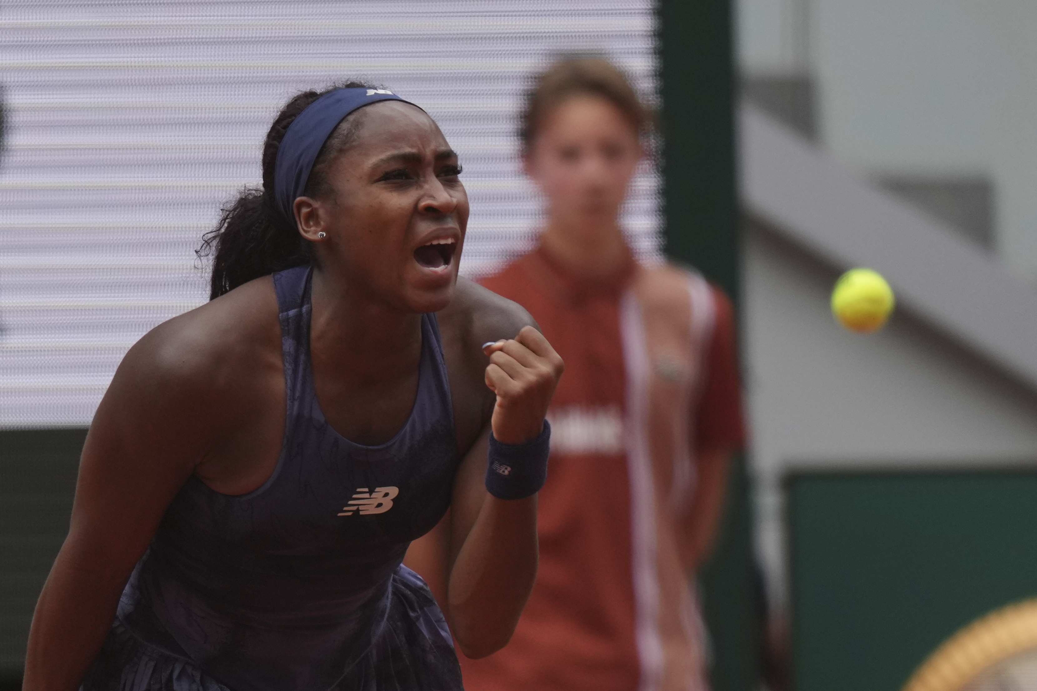 Coco Gauff of the U.S. celebrates as she won the fourth round match of the French Tennis Open against Russia's Ekaterina Alexandrova at the Roland-Garros stadium in Paris, Monday, June 2, 2025. 