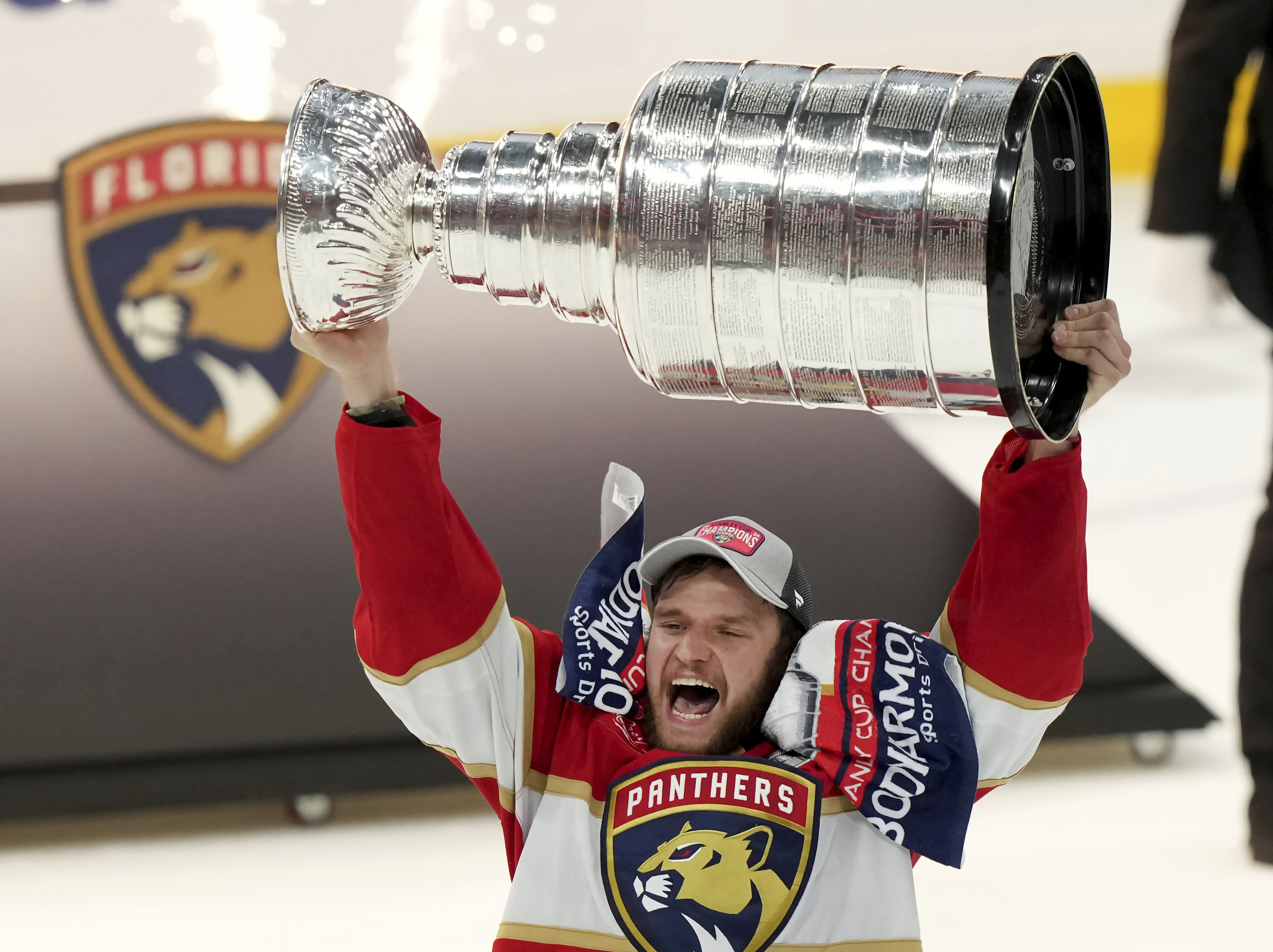 FILE - Florida Panthers forward Aleksander Barkov hoists the Stanley Cup after defeating the Edmonton Oilers in Game 7 of the NHL hockey Stanley Cup Final, Monday, June 24, 2024, in Sunrise, Fla. 