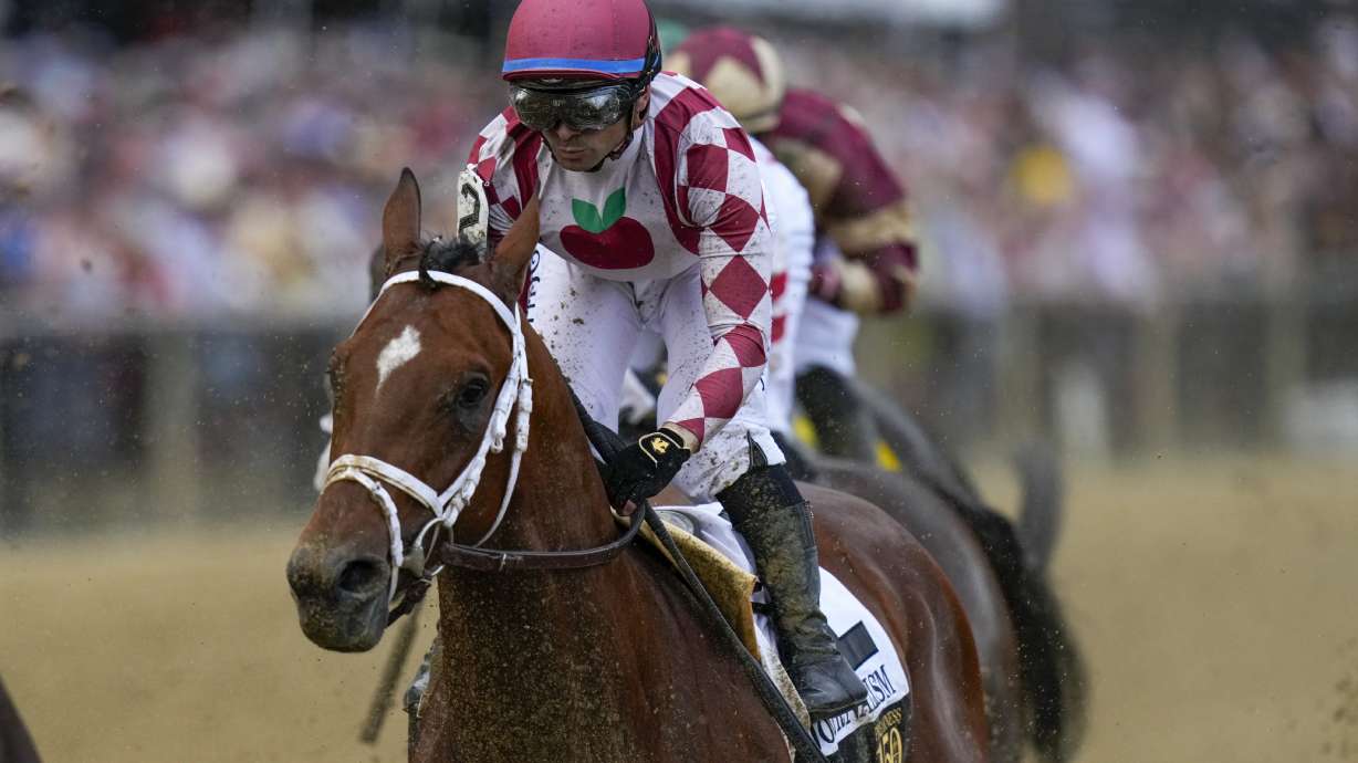 Umberto Rispoli, atop Journalism, participates in the 150th running of the Preakness Stakes horse race Saturday, May 17, 2025, at Pimlico Race Course in Baltimore.