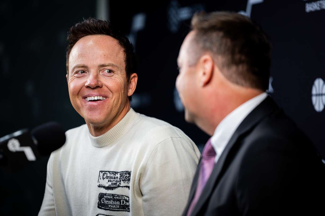 Austin Ainge, right, president of basketball operations for the Utah Jazz, speaks during an introductory media availability with Utah Jazz Governor Ryan Smith at Zions Bank Basketball Campus in Salt Lake City on Monday, June 2, 2025.