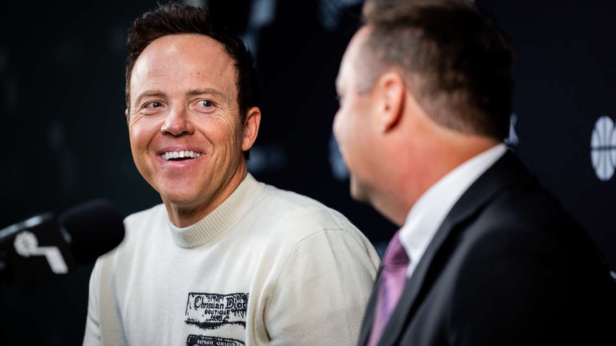Austin Ainge, right, president of basketball operations for the Utah Jazz, speaks during an introductory media availability with Utah Jazz Governor Ryan Smith at Zions Bank Basketball Campus in Salt Lake City on Monday, June 2, 2025.