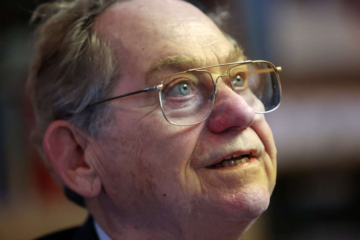 William "Bill" Reagan talks about his late wife, Julia Reagan, during an interview in his office at Reagan Outdoor Advertising in Salt Lake City on May 29. He finds comfort in seeing any of the 300 billboards honoring Julia Reagan.