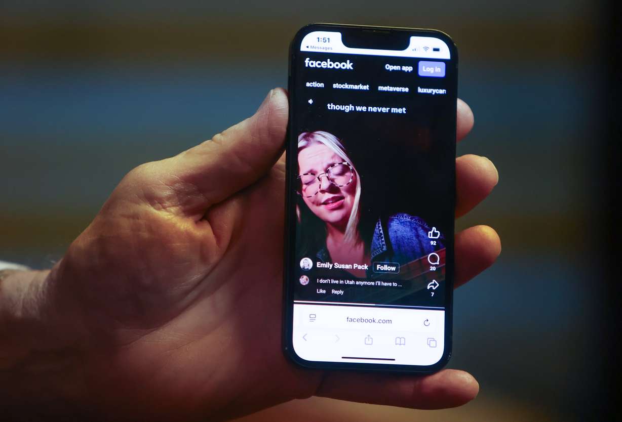 William "Bill" Reagan plays a song by Emily Susan Pack, a stranger who wrote about his late wife, Julia Reagan, and the billboards honoring her, during an interview in his office at Reagan Outdoor Advertising in Salt Lake City on May 29. He finds comfort in seeing any of the 300 billboards honoring Julia Reagan in Utah and beyond.