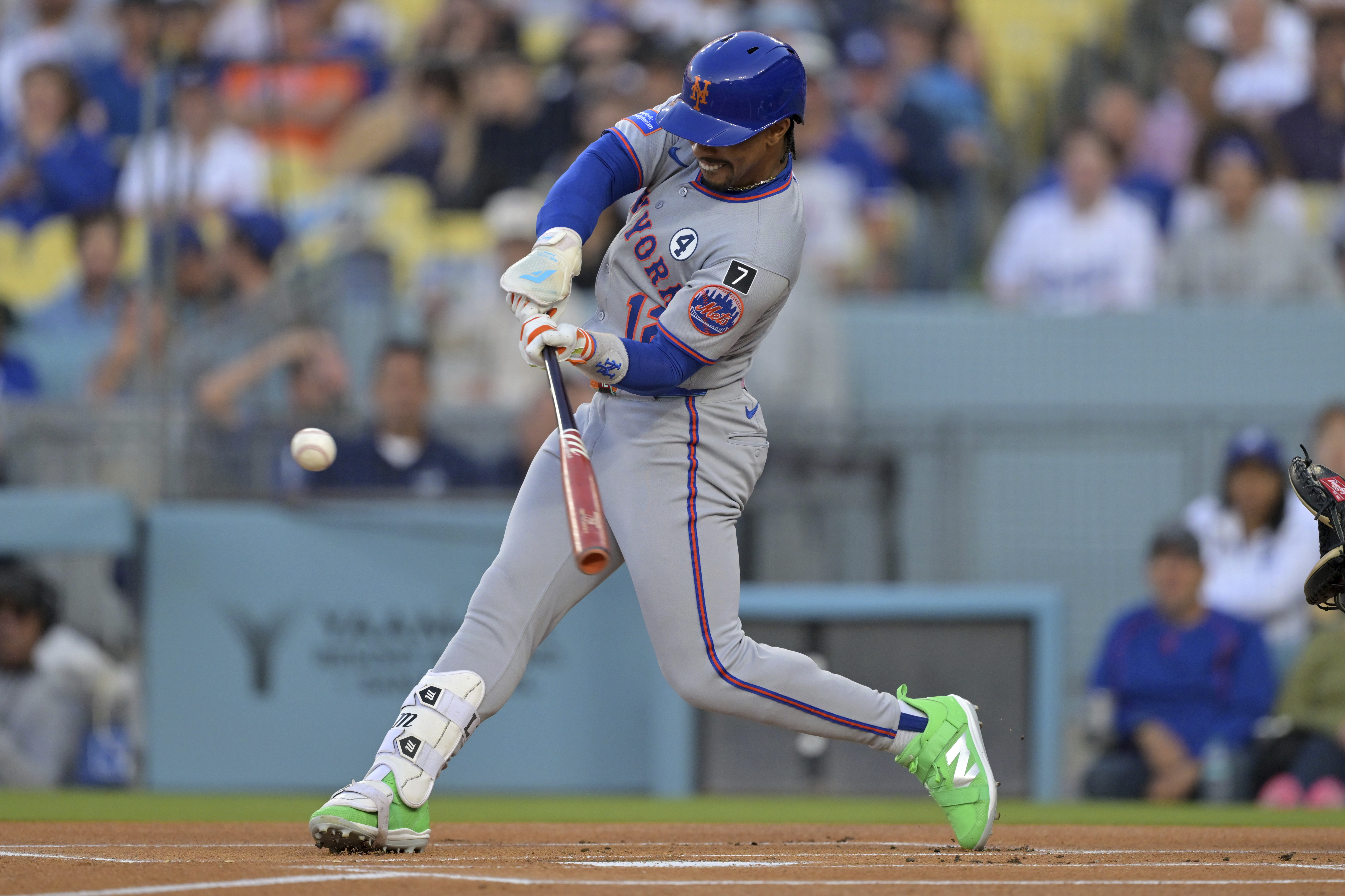 New York Mets' Francisco Lindor hits a solo home run in the first inning of a baseball game against the Los Angeles Dodgers, Monday, June 2, 2025, in Los Angeles. 