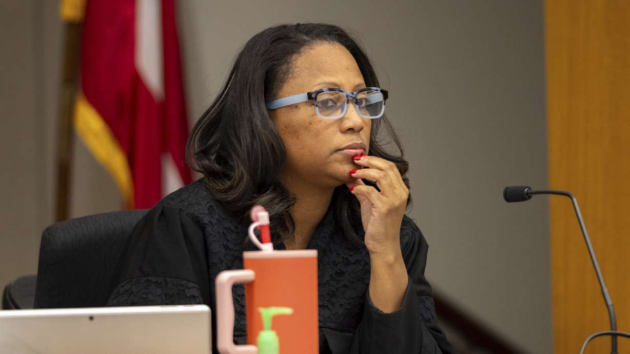 Judge Shukura Ingram listens during a hearing at Fulton County Court in Atlanta on Feb. 20. An agreement over COVID vaccine availability to infants has led to a pause of some executions in Georgia, the judge ruled.