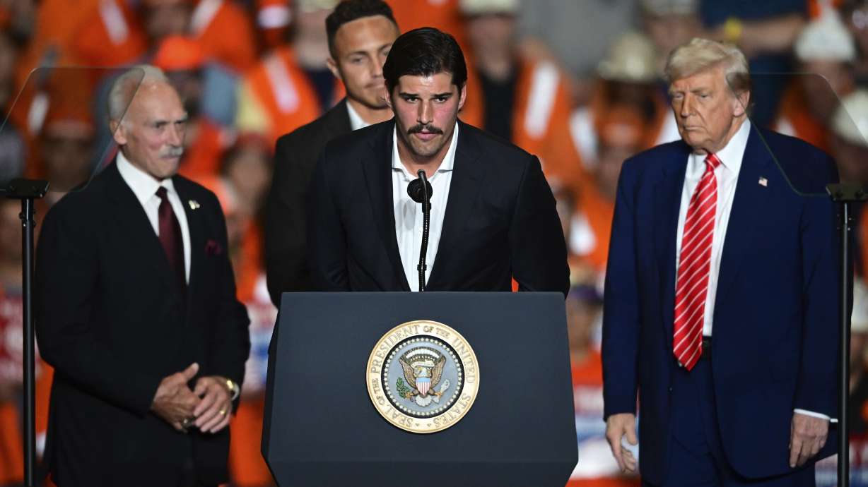 Pittsburgh Steelers quarterback Mason Rudolph speeks as former Pittsburgh Steelers Rocky Bleier and Pittsburgh Steelers safety Miles Killebrew listen at the U.S. Steel Mon Valley Works-Irvin plant, Friday, May 30, 2025, in West Mifflin, Pa.